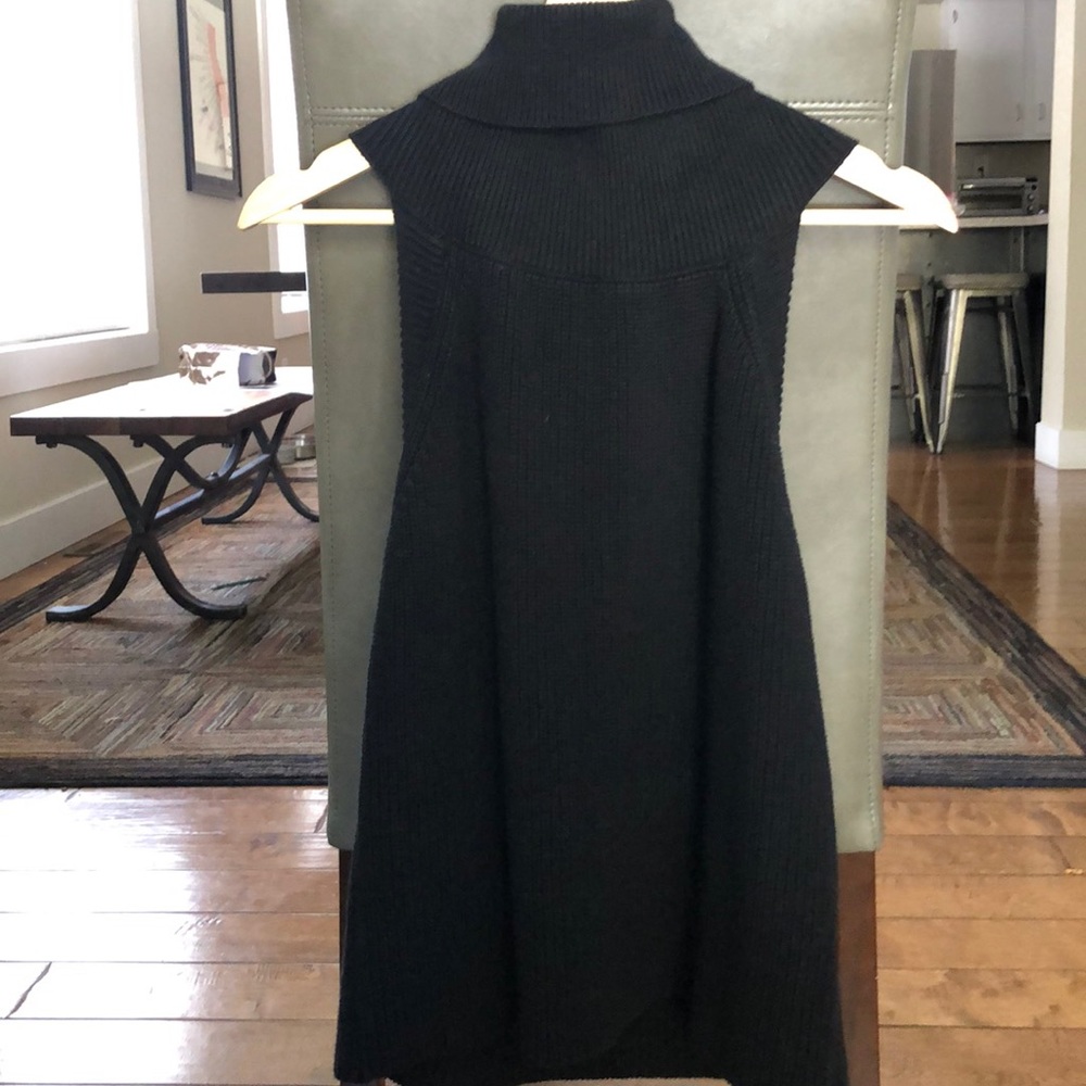 Open back, turtleneck sweater!